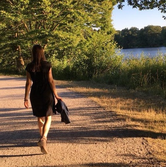 woman by the lake in summer